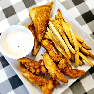 a plate of fries and a dip