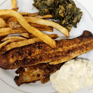 Blackened or grilled catfish plate with hand cut French fries and collard greens