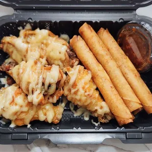 Five wings &amp; Five lumpias, $12.50. The wings were crispy but could be seasoned more. The lumpias were tasty.