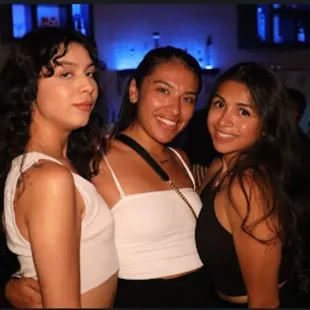 three women posing for a picture