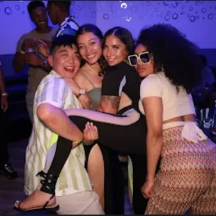 a group of people posing for a picture