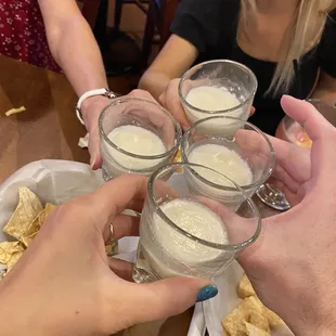 a group of people toasting