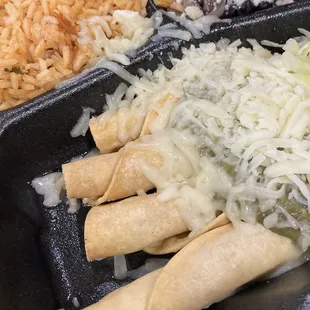 Rolled tacos. Rice, beans