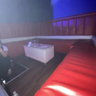 a man sitting in a booth