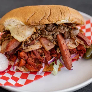 a meat sandwich with pickles