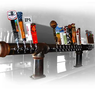 a row of beer taps