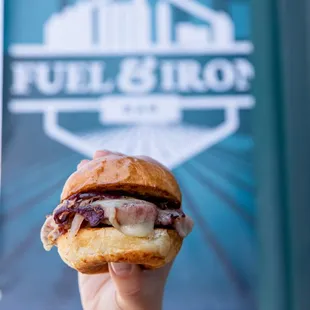 Bojon Town Sliders: Pan-fried Klobasi, Krakow Cheese, Sauerkraut, Griddled Onions, and Yellow Mustard.