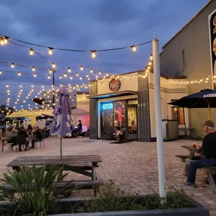 a man sitting at a picnic table