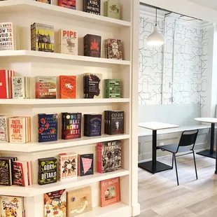 a bookshelf in a coffee shop