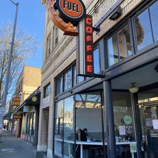 a neon sign for a coffee shop