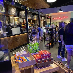 people shopping at a grocery store