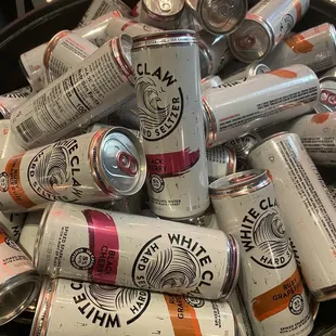 a bowl full of cans of beer