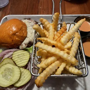 Cougar burger with fries and fry sauce.