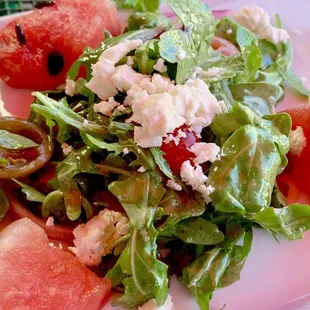 Arugula Salad with watermelon and goat cheese.