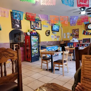 Small clean brightly colored dining room