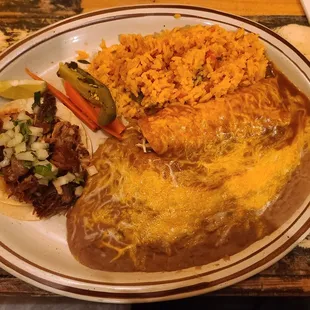 Carnitas Street Taco and Chicken Enchilada combo