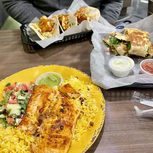 Salmon platter, fish tacos and chicken, spinach, mushroom and cheese quesadilla