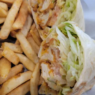 Chicken Buffalo wrap with French fries ... so good and establishment is extremely clean and owners are amazing all around 5 stars!