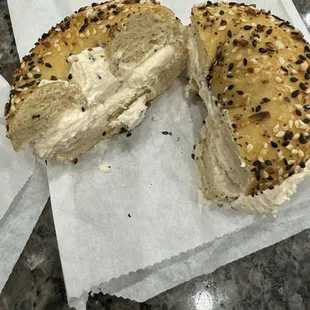 Toasted everything bagel with lox cream cheese schmear.