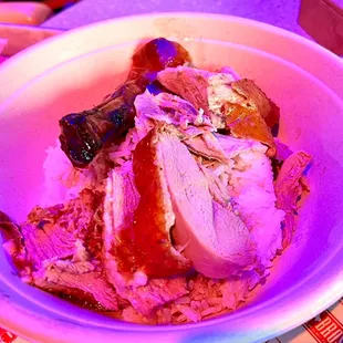 $20 Peking duck with rice, including plum sauce and chili sauce on the side.