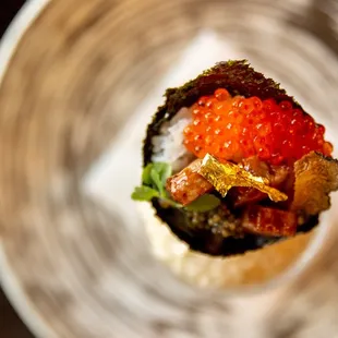 a sushi roll with cavia