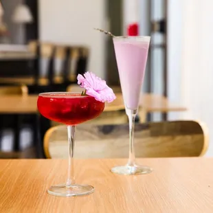 two cocktails on a table