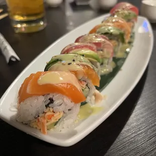 a sushi roll on a white plate