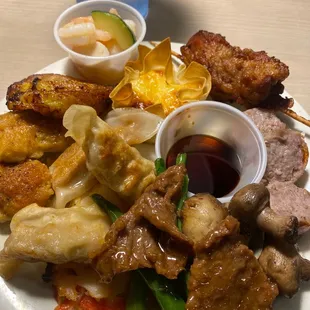 Egg tea (sort of like a phillo dough w/ creamy eff custard) DELICIOUS!! Chicken satay, pot stickers, italian sausage, sweet plaintains.