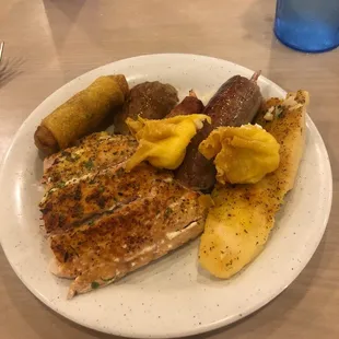 Salmon,egg roll, sausage,stuffed shrimp,cod.