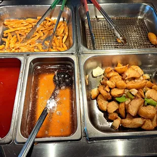 French Fries, buttered Potatoes, black pepper shrimp (missing) and sweet sour &amp; orange sauces yummy