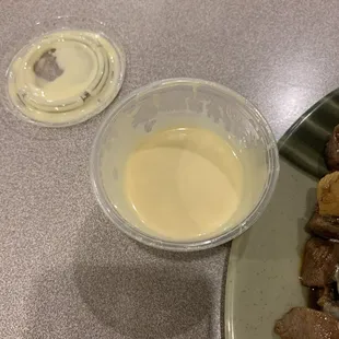 Only saving grace to mask poor flavor profile of food. Some kind of sweet white dressing.