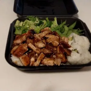 Chicken teriyaki,  salad, edamame, and California rolls.