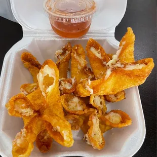 Crab Rangoon, $6. Handmade to order, delicious and served with a sweet chili sauce. Worth every penny.