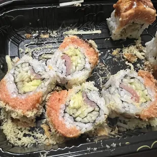 a tray of sushi rolls