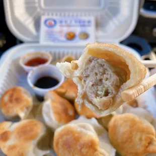 Lamb Dumplings (12 pc - $14). Plus $1 for pan-fried.