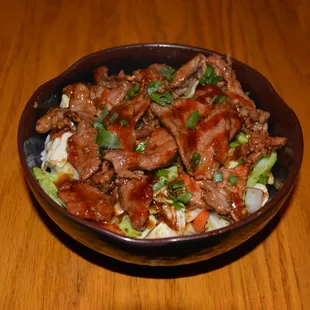 a bowl of beef and rice