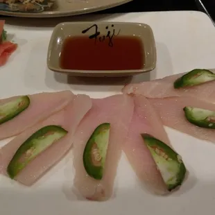 Yellowtail jalepeño appetizer, delivered in the middle of dinner