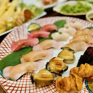 Toro, hotate, hamachi, madai, abalone, ikura, uni