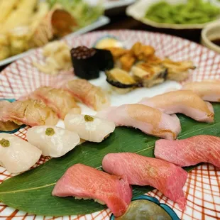 Toro, hotate, hamachi, madai, abalone, ikura, uni