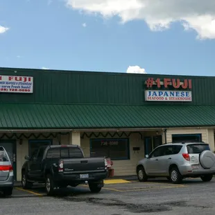 cars parked in front of the restaurant