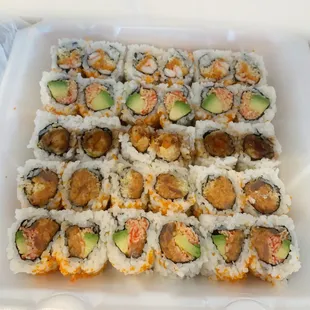 Our sushi rolls! They were kind enough to label the top of the box to show the order they were in so we didn&apos;t have to guess what was what.