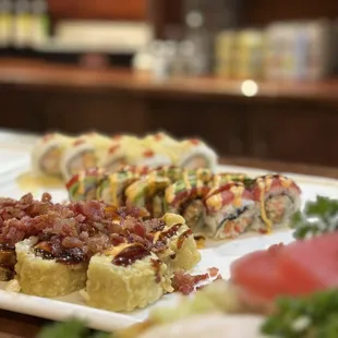 a variety of sushi rolls