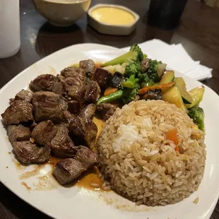 a plate of rice and vegetables