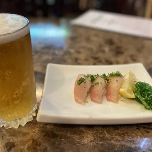 Tuna sashimi and a definite asahi beer!