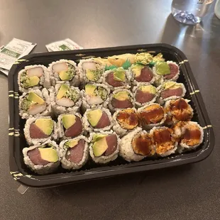 Tuna avocado roll, sweet potato roll, and California roll.