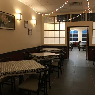 dining area with tables and chairs