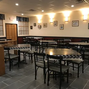 dining area with tables and chairs