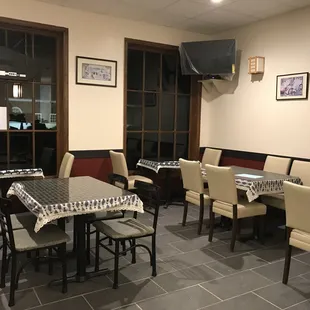 dining area with tables and chairs