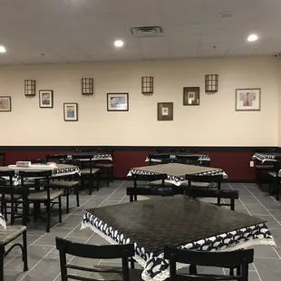 dining area with tables and chairs