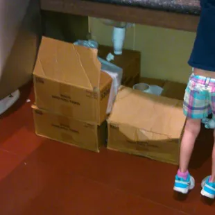 The floors were sticky, and boxes sitting out.